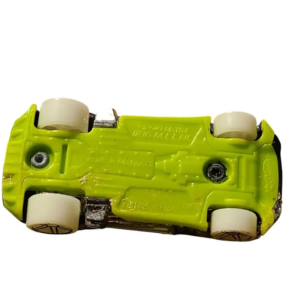 2010 Hot Wheels Twinduction Diecast Car Toy Black Green White